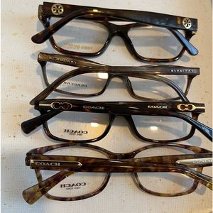 4 eyeglass frames 2-Coach 1-Tory Burch, one Burberry